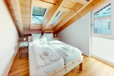 Ein Bett oder Betten in einem Zimmer der Unterkunft HöhenRausch