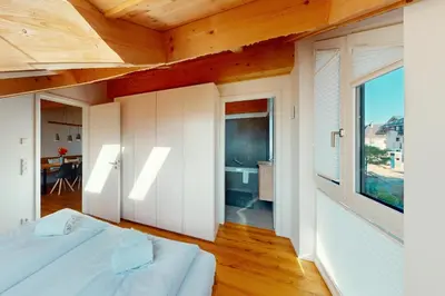 Ein Bett oder Betten in einem Zimmer der Unterkunft HöhenRausch