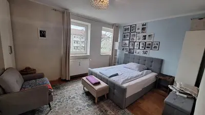 Ein Bett oder Betten in einem Zimmer der Unterkunft Beautiful 2-bedroom apartment in Munich center