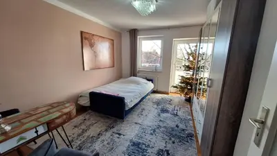 Ein Bett oder Betten in einem Zimmer der Unterkunft Beautiful 2-bedroom apartment in Munich center