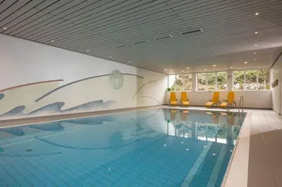 Der Swimmingpool an oder in der Nähe von 4 Star Maisonnette mit Kaiser Blick, Sauna, Schwimmbad