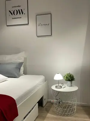Ein Bett oder Betten in einem Zimmer der Unterkunft Modernes City-Apartment Nähe Uniklinikum und Zentrum