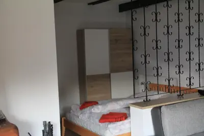 Ein Bett oder Betten in einem Zimmer der Unterkunft Ferienwohnung Landsberg am Lech