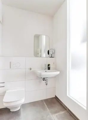 Ein Badezimmer in der Unterkunft My Suite II - Augsburg City - Netflix