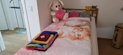 Ein Bett oder Betten in einem Zimmer der Unterkunft Ferienhaus mit 3 Schlafzimmer in Seenähe