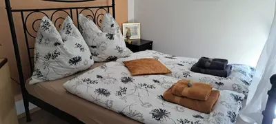 Ein Bett oder Betten in einem Zimmer der Unterkunft Ferienhaus mit 3 Schlafzimmer in Seenähe