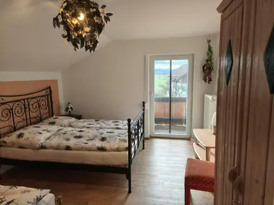 Ein Bett oder Betten in einem Zimmer der Unterkunft Ferienhaus mit 3 Schlafzimmer in Seenähe
