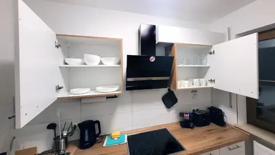 Küche/Küchenzeile in der Unterkunft MADISON Homes Apartment 50 qm in Prien mit Balkon, Bergblick, Parkplatz, zentral gelegen