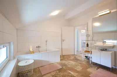 Ein Badezimmer in der Unterkunft Ferienwohnung zum Hochgarten