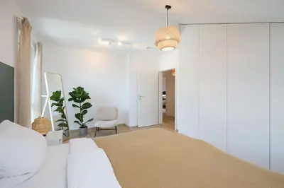 Ein Bett oder Betten in einem Zimmer der Unterkunft Ferienwohnung zum Hochgarten