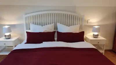 Ein Bett oder Betten in einem Zimmer der Unterkunft Ferienwohnung am alten Kino