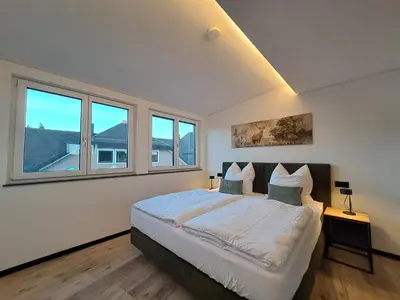 Ein Bett oder Betten in einem Zimmer der Unterkunft Lieblingsplatz Apartments