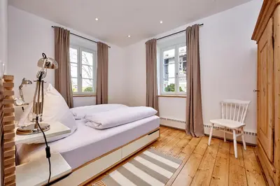 Ein Bett oder Betten in einem Zimmer der Unterkunft Alpenwelt