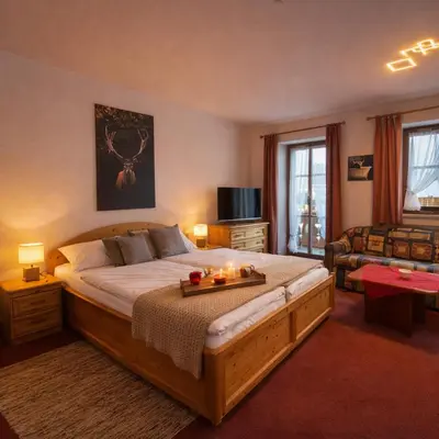 Ein Bett oder Betten in einem Zimmer der Unterkunft Ferienwohnungen Buchner Garmisch