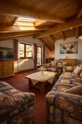Ein Bett oder Betten in einem Zimmer der Unterkunft Ferienwohnungen Buchner Garmisch