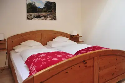 Ein Bett oder Betten in einem Zimmer der Unterkunft Ferienwohnungen Wendelstein