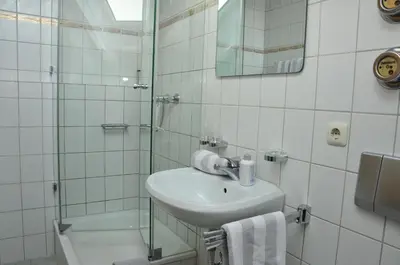 Ein Badezimmer in der Unterkunft Ferienwohnungen Wendelstein