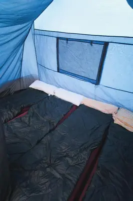 Ein Bett oder Betten in einem Zimmer der Unterkunft Løst Souls Oktoberfest Campsite