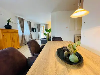Ein Sitzbereich in der Unterkunft Ferienwohnung 'Breitenstein' am Schliersee