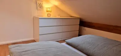 Ein Bett oder Betten in einem Zimmer der Unterkunft Ferienwohnung SEElig