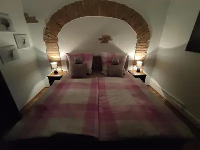 Ein Bett oder Betten in einem Zimmer der Unterkunft Ferienwohnung beim Maler Gandi