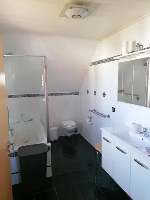 Ein Badezimmer in der Unterkunft 2 Zimmer Apartment mit Küche und Bad