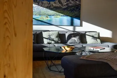 Ein Sitzbereich in der Unterkunft Chalet Dahoam