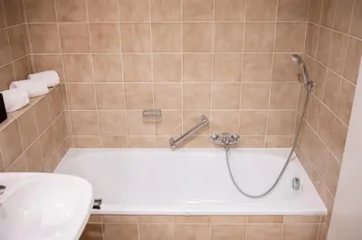 Ein Badezimmer in der Unterkunft Platz für 8 Pers - C4S Come4Stay Monteure 