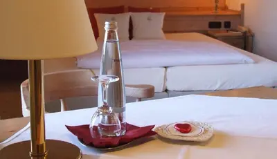 Ein Bett oder Betten in einem Zimmer der Unterkunft Hotel & Landgasthof Osterseen