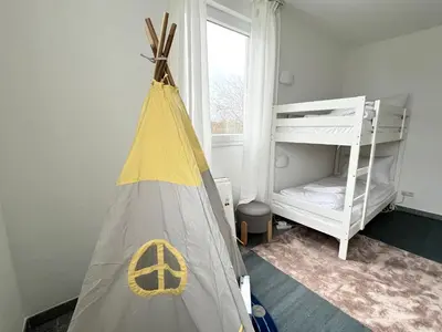 Ein Bett oder Betten in einem Zimmer der Unterkunft LTA Apartment München Süd No3 Friends & Family