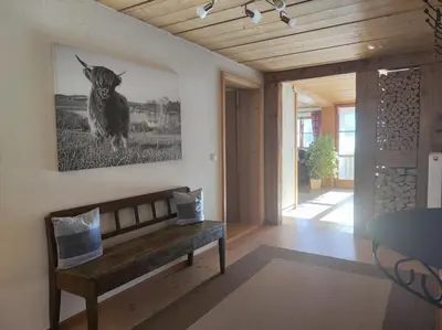 Ein Sitzbereich in der Unterkunft Ferienhof beim Bohlar - Geiselstein