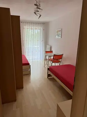 Ein Bett oder Betten in einem Zimmer der Unterkunft Ferienwohnung Schütz