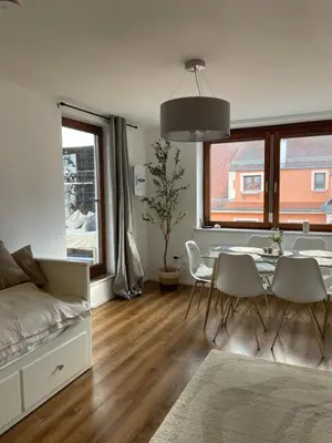 Ein Sitzbereich in der Unterkunft Stylisches Apartment mit Dachterrasse und Whirlpool