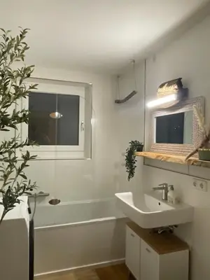 Ein Badezimmer in der Unterkunft Stylisches Apartment mit Dachterrasse und Whirlpool