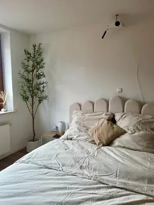 Ein Bett oder Betten in einem Zimmer der Unterkunft Stylisches Apartment mit Dachterrasse und Whirlpool