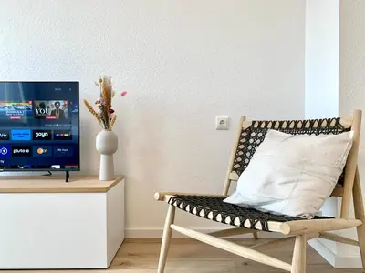 TV/Unterhaltungsangebot in der Unterkunft Modern 2-Bedroom Apartment Near Messe 2-4 Guests