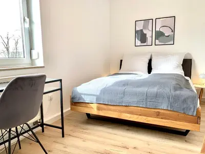Ein Bett oder Betten in einem Zimmer der Unterkunft Modern 2-Bedroom Apartment Near Messe 2-4 Guests