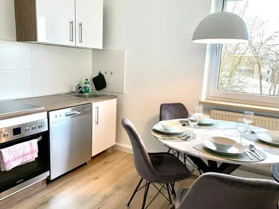 Küche/Küchenzeile in der Unterkunft Modern 2-Bedroom Apartment Near Messe 2-4 Guests
