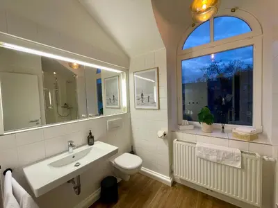 Ein Badezimmer in der Unterkunft Munich Penthouse with Kitchen, Roofgarden and Parking