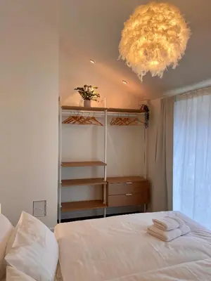 Ein Bett oder Betten in einem Zimmer der Unterkunft Munich Penthouse with Kitchen, Roofgarden and Parking