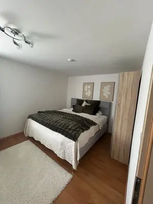 Ein Bett oder Betten in einem Zimmer der Unterkunft Gemütliches Haus zentral gelegen
