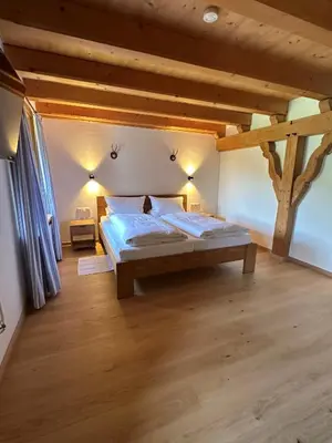 Ein Bett oder Betten in einem Zimmer der Unterkunft Ferienwohnung Zum Wunsch