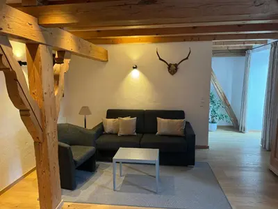Ein Sitzbereich in der Unterkunft Ferienwohnung Zum Wunsch
