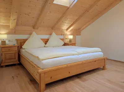 Ein Bett oder Betten in einem Zimmer der Unterkunft Puchnerhof