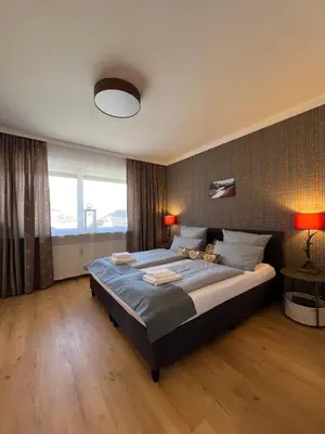 Ein Bett oder Betten in einem Zimmer der Unterkunft Kuckucks Nest