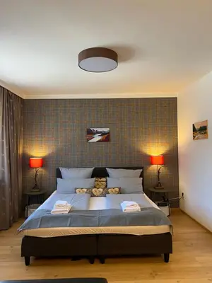 Ein Bett oder Betten in einem Zimmer der Unterkunft Kuckucks Nest