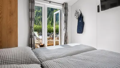 Ein Bett oder Betten in einem Zimmer der Unterkunft Wendelstein Mountain Camp