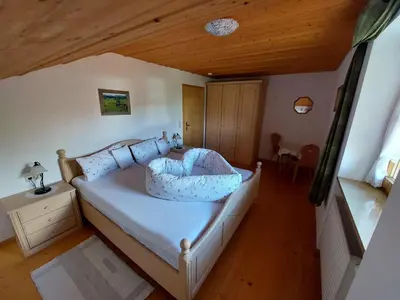 Ein Bett oder Betten in einem Zimmer der Unterkunft Wörle, Ferienhof