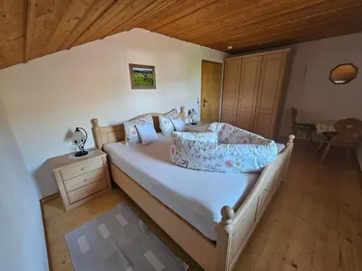 Ein Bett oder Betten in einem Zimmer der Unterkunft Wörle, Ferienhof