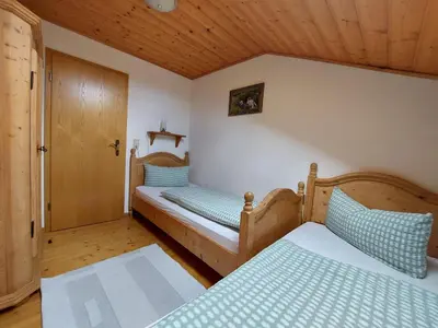 Ein Bett oder Betten in einem Zimmer der Unterkunft Wörle, Ferienhof